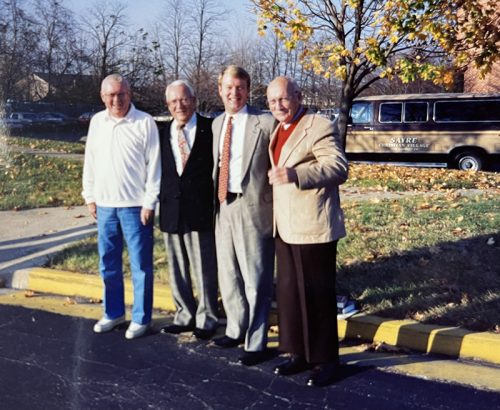 Dale & Family in front of the Baunta Apartments